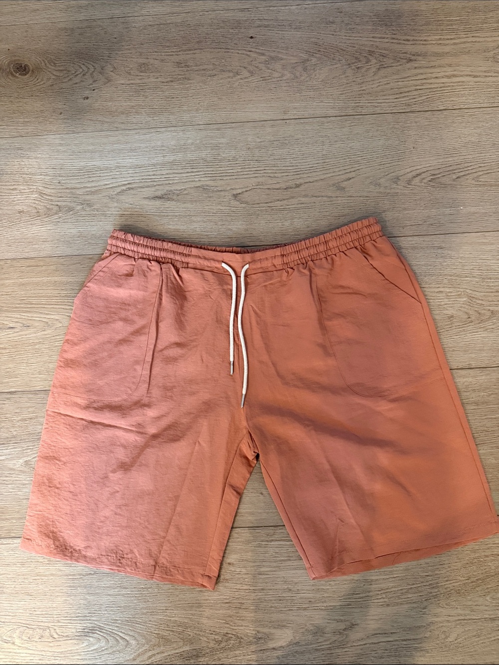 NWT women’s lightweight 3XL orange elastic waist, light summer shorts w/pockets.